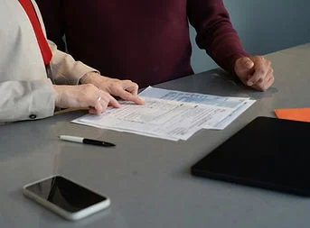 Business owners reviewing tax strategies